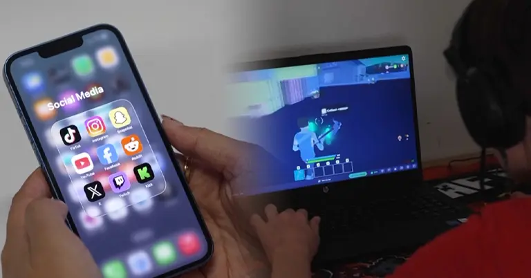 মোবাইল ফোন ও ভিডিও গেমস খেলছে একটি শিশু